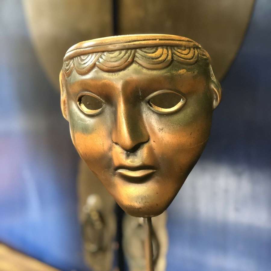Greek tragedy mask in brass