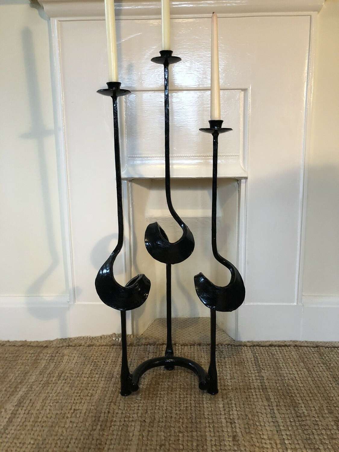 Hand forged iron candle holder