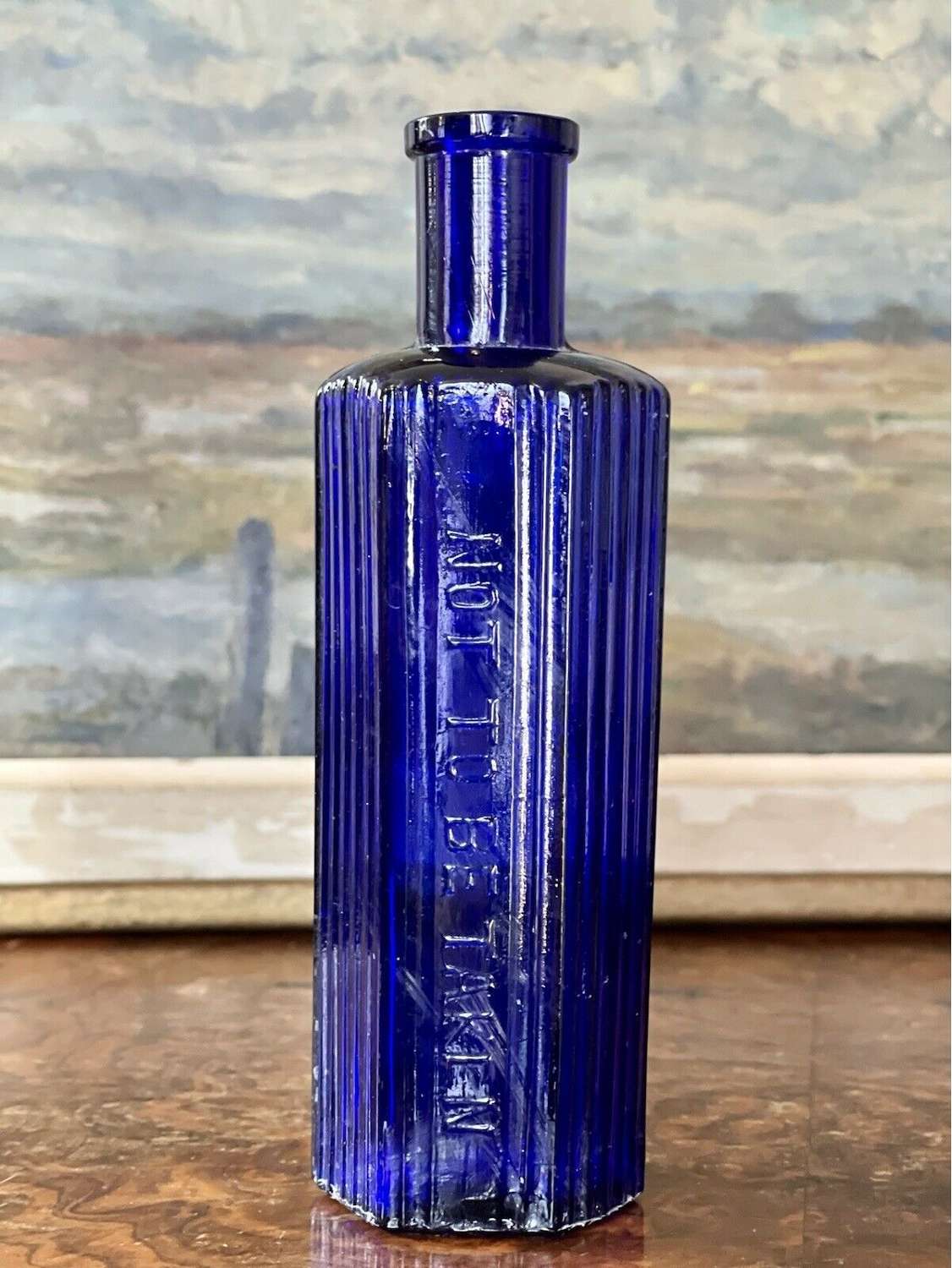 Victorian blue glass apothecary bottle