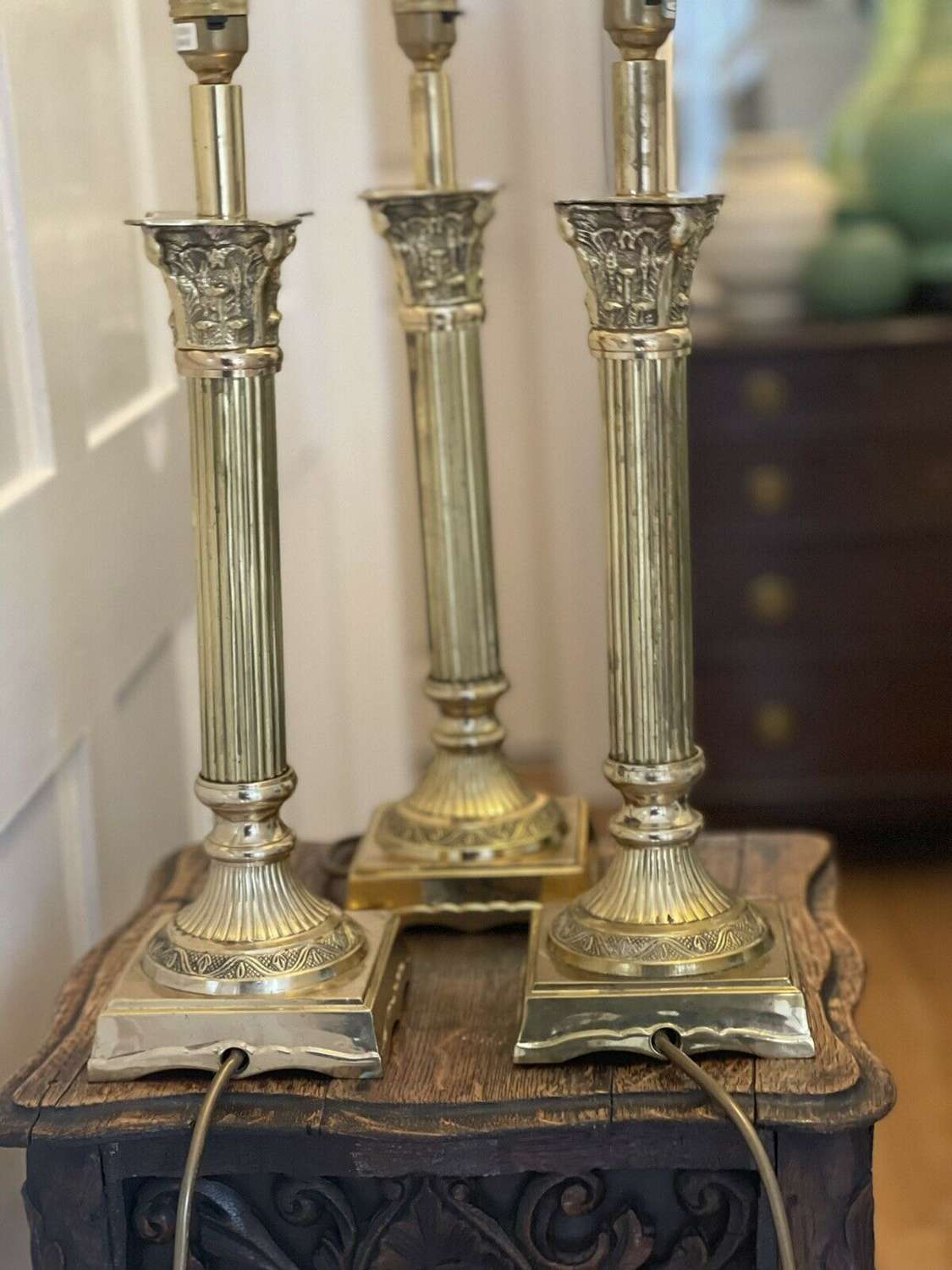 A trio of Brass Corinthian lamp bases.