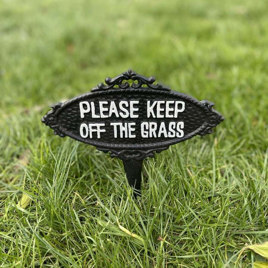 Cast iron sign "Keep off the grass"