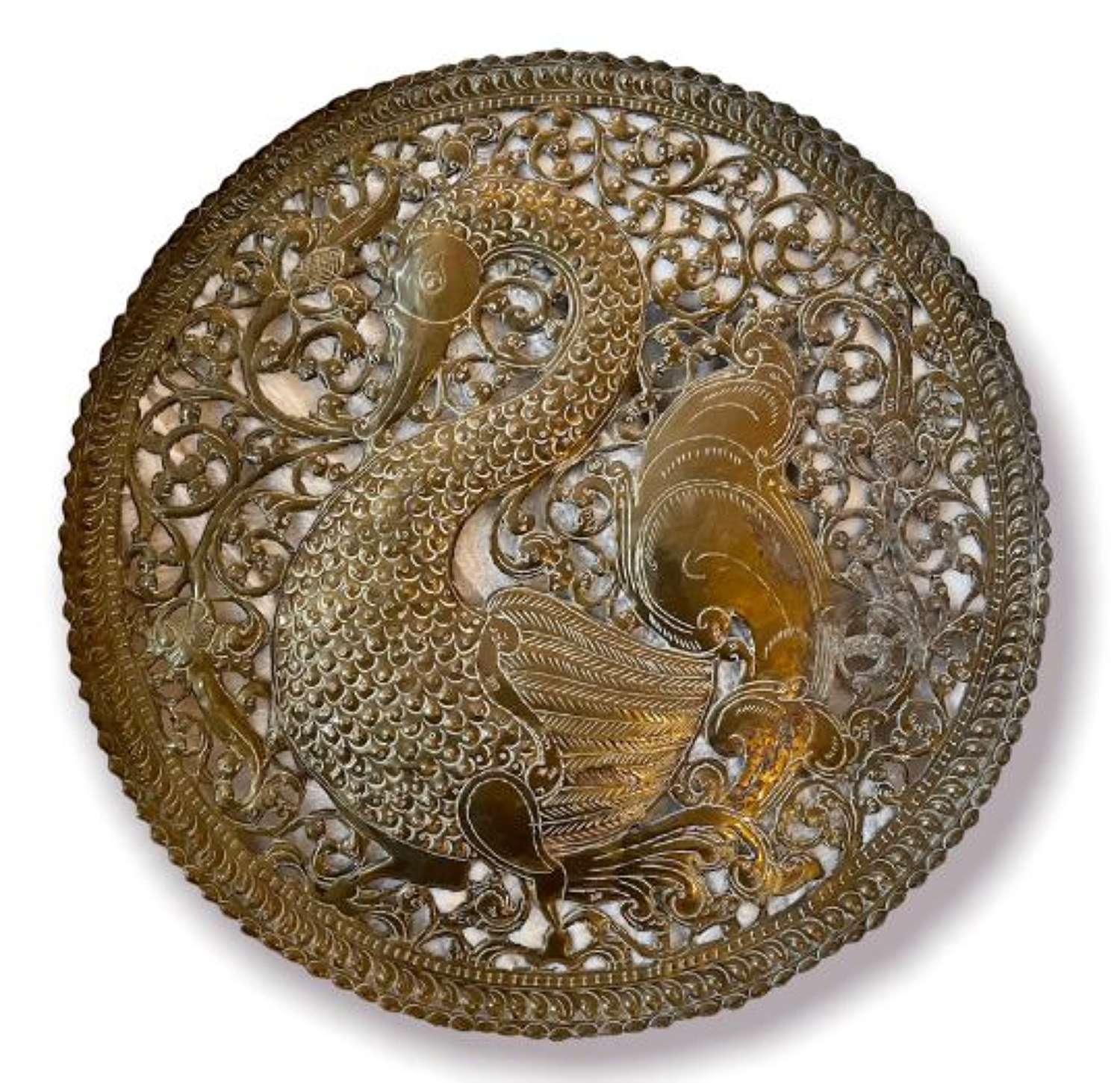 Antique brass panel depicting a swan