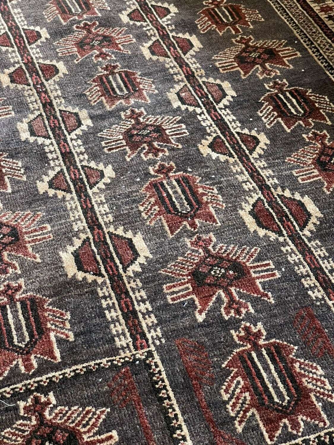 Vintage handwoven wool Persian Kazak rug