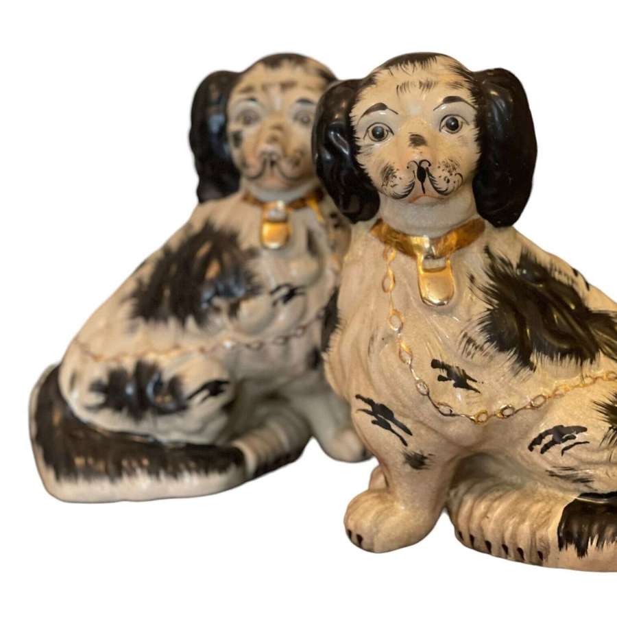 A pair of China Staffordshire style dogs Jordan Tout Court 1897.