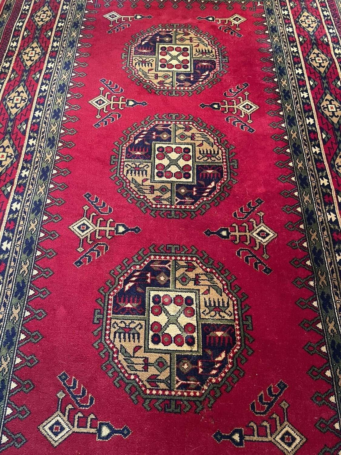 Vintage Persian red ground wool rug
