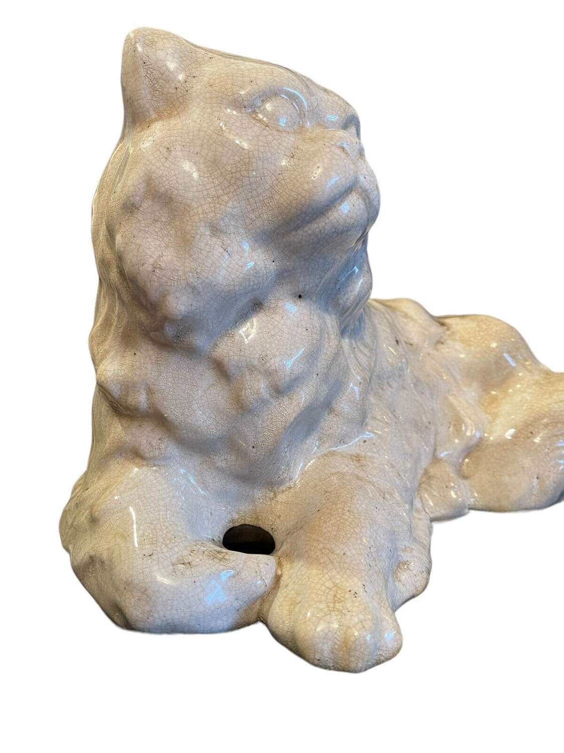19th Century pottery sculpture of a reclining cat