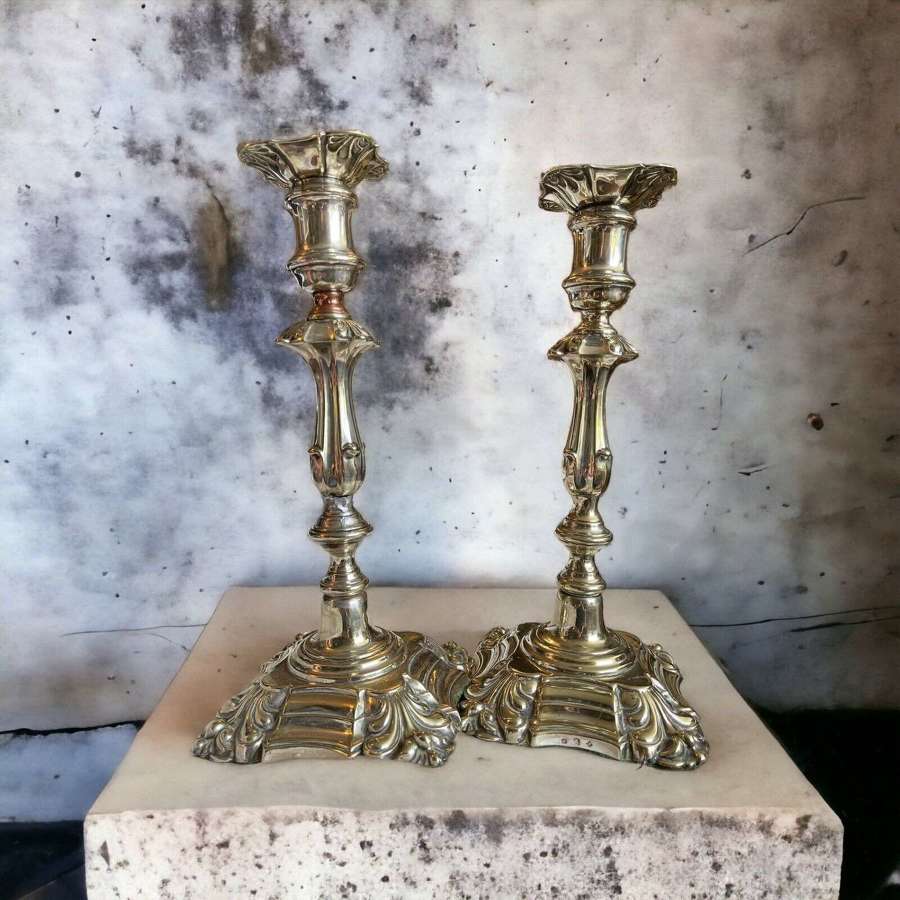 A lovely pair of 19th century silvered candlesticks.