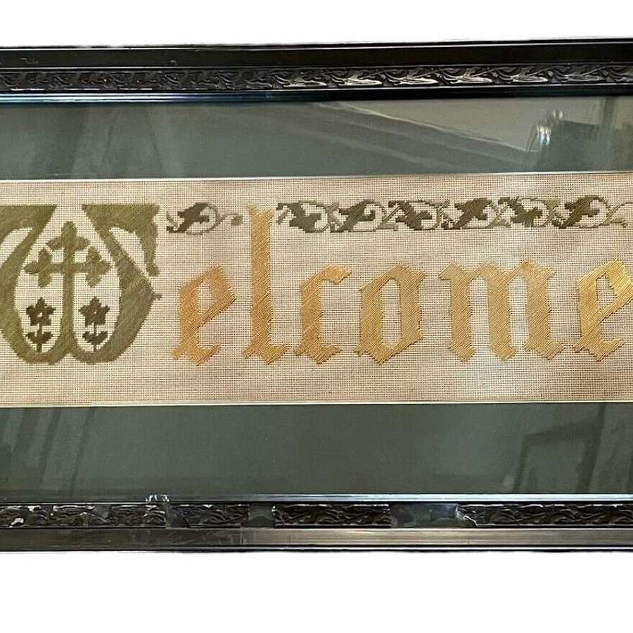 Arts and crafts embroidery welcome sign