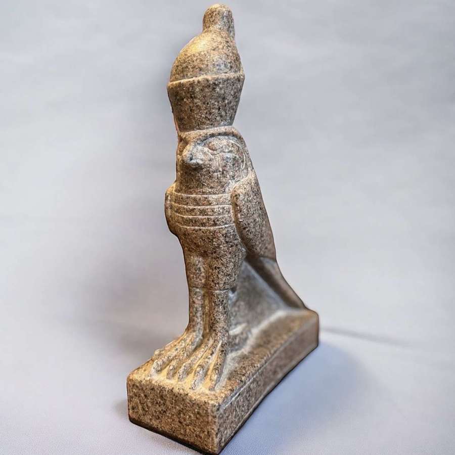 Vintage stone statue of Egyptian god Horus