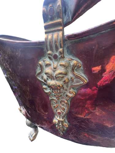 Georgian Copper coal scuttle with lion paw feet