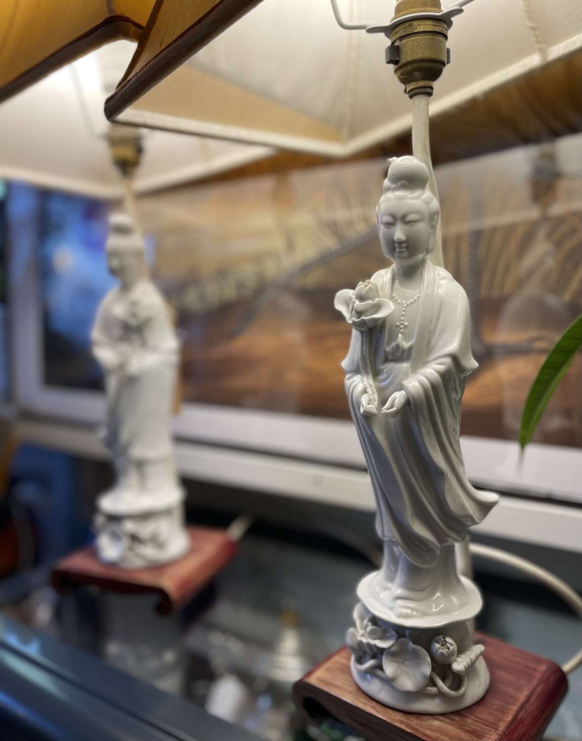 A pair of vintage Blanc De Chine Guanyin figure table lamps