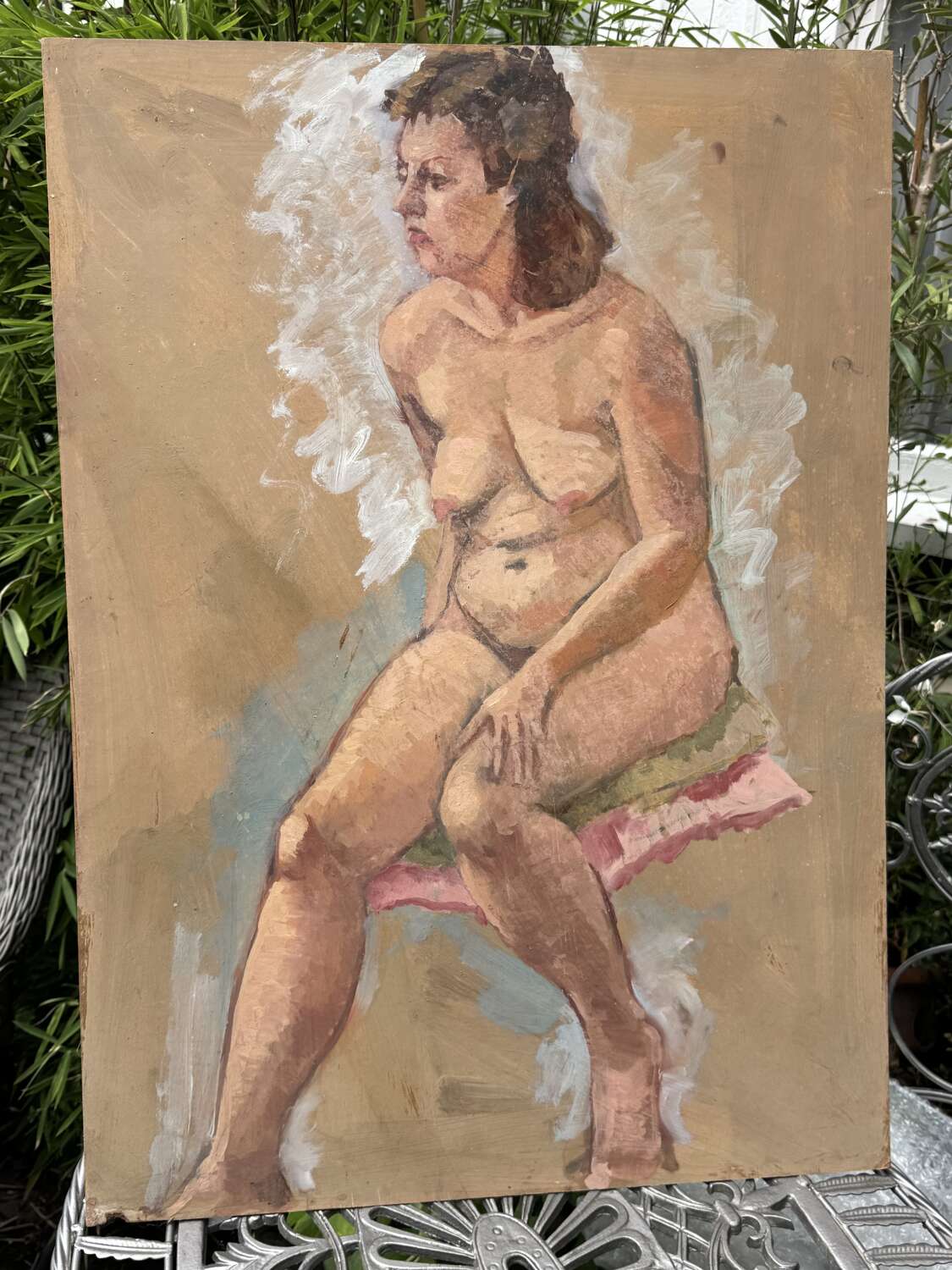 A wonderfully expressive vintage studio painting of a seated female